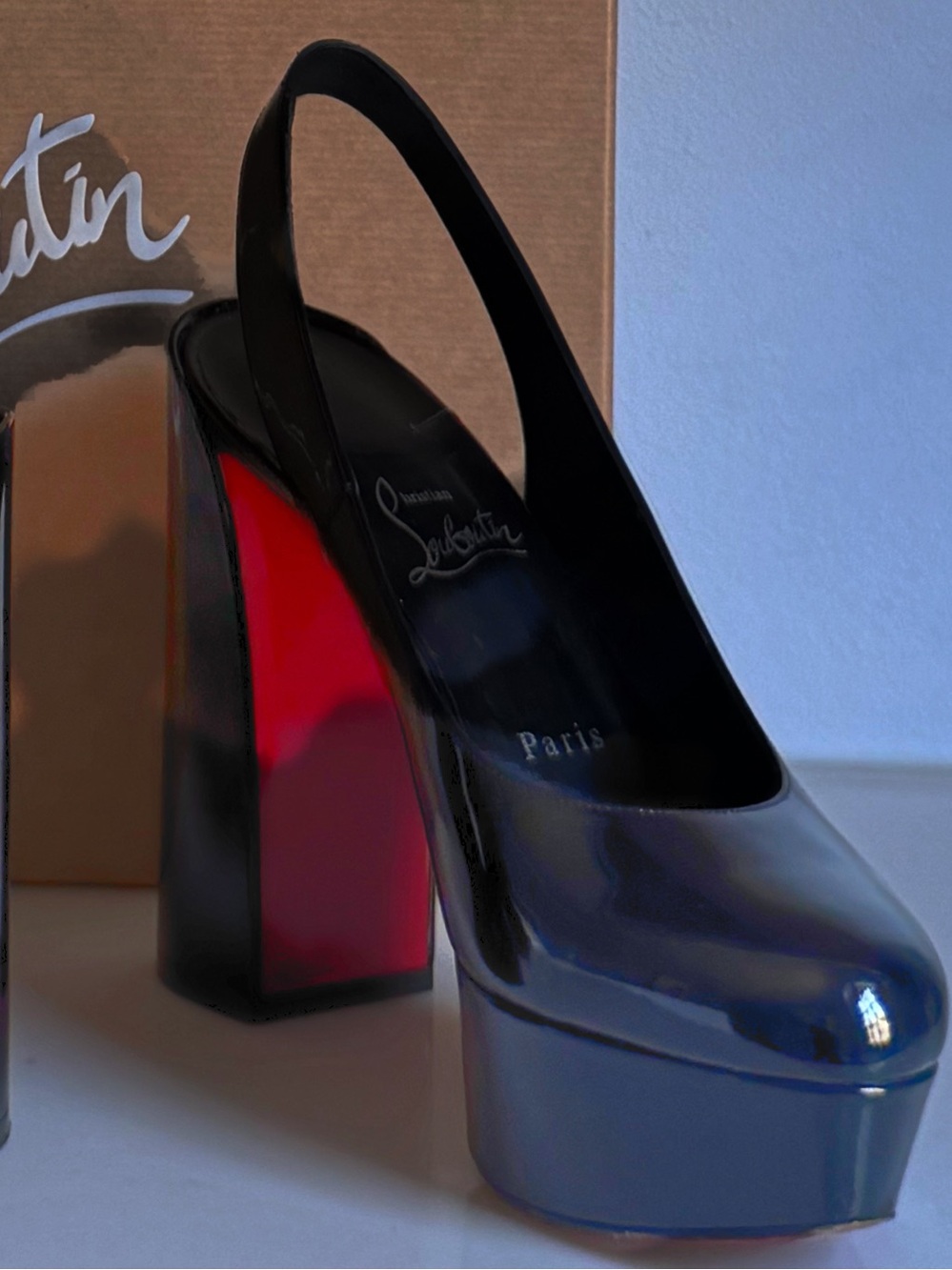 Women’s Christian Louboutin
Black Platform Slingback Heels